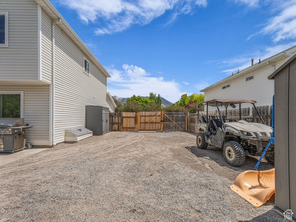 View of yard with a gate