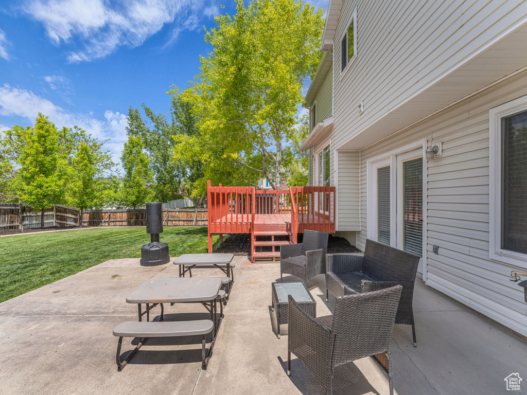 View of patio with a deck and outdoor lounge area