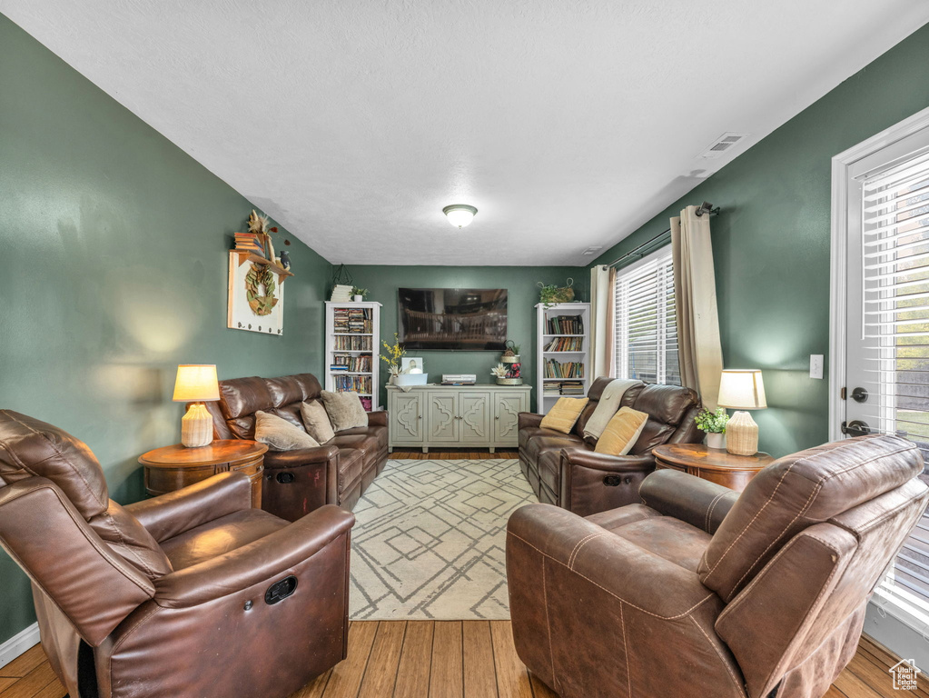 Living area featuring wood finished floors