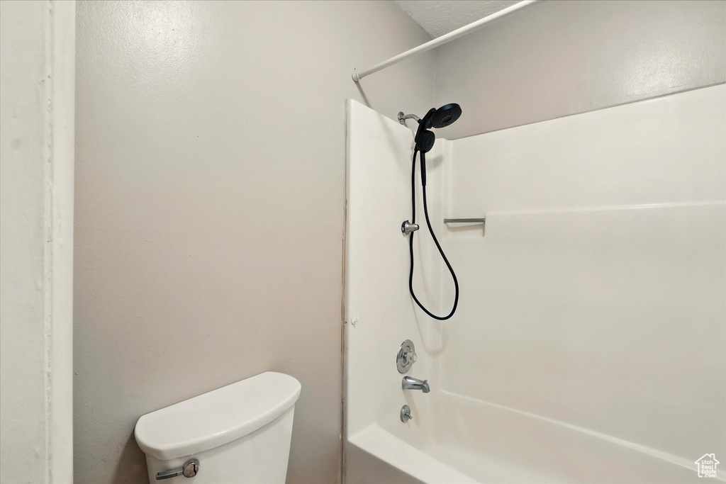Full bath with toilet and  shower combination