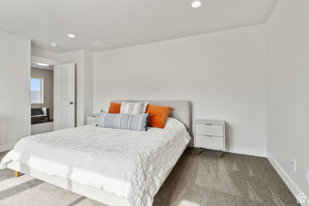 Bedroom featuring carpet, baseboards, and recessed lighting