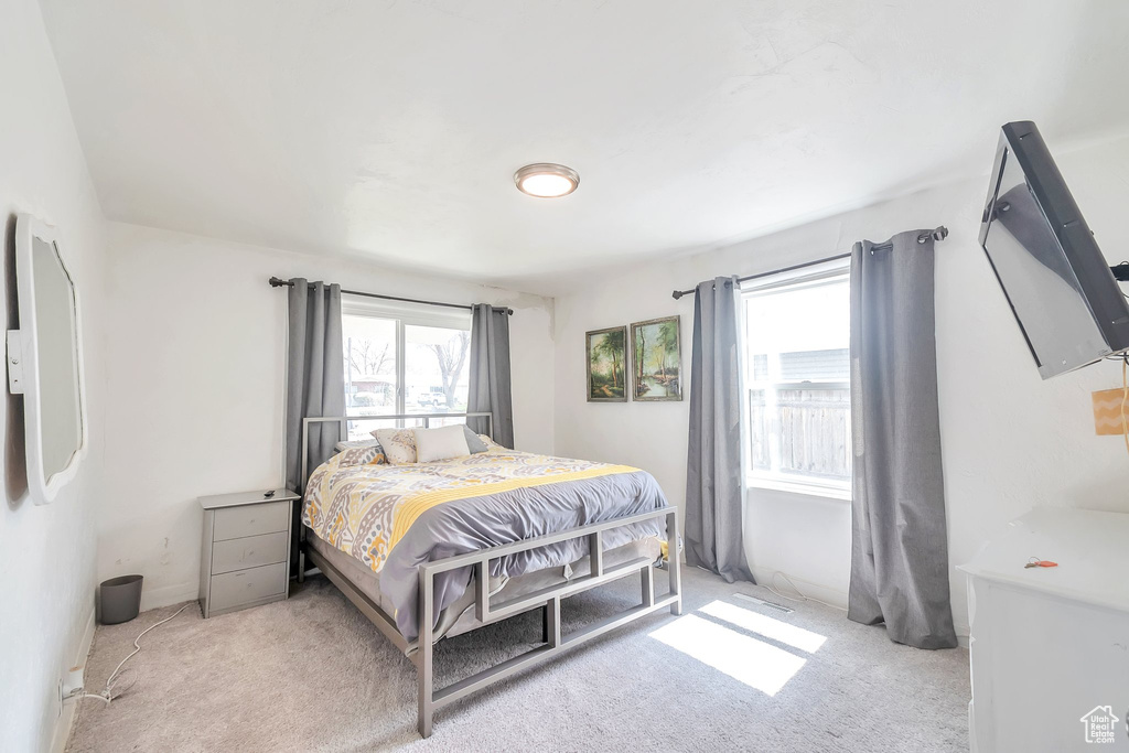 Bedroom featuring carpet flooring