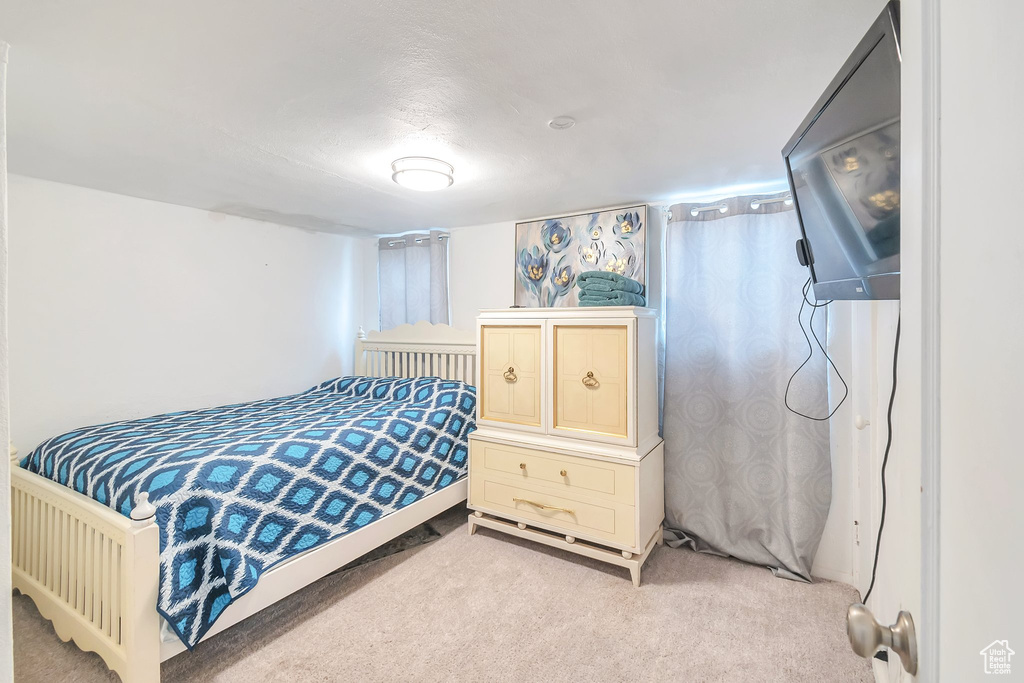 View of carpeted bedroom