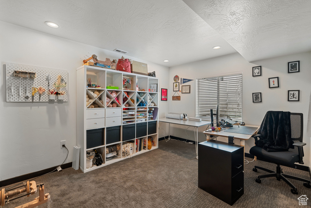 Carpeted office with recessed lighting, a textured ceiling, and baseboards