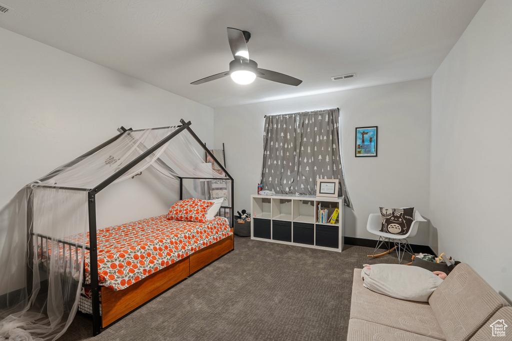 Bedroom with carpet floors and ceiling fan
