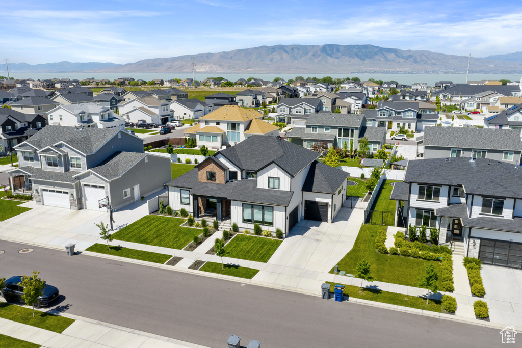 Aerial view of residential area with a mountain backdrop