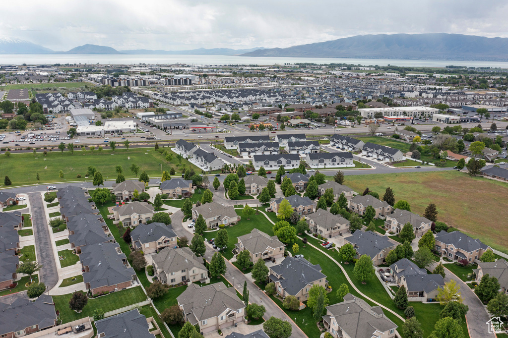 View of property location featuring a mountain backdrop and nearby suburban area