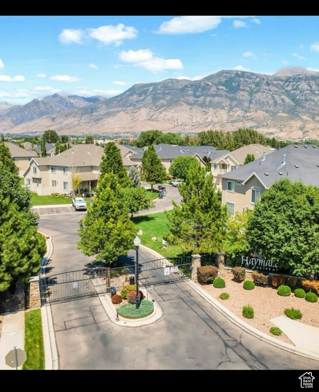 View of mountain backdrop with nearby suburban area