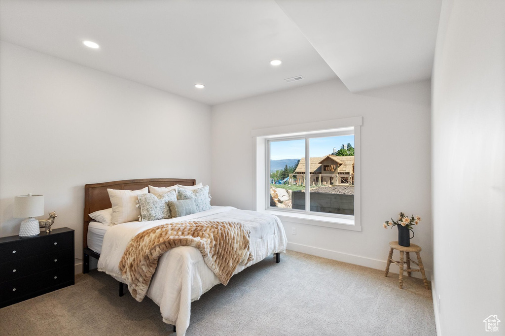 Bedroom featuring carpet floors, recessed lighting, and baseboards