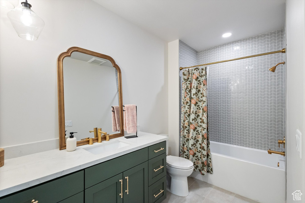 Full bath with vanity, toilet, shower / bath combination with curtain, tile patterned floors, and recessed lighting