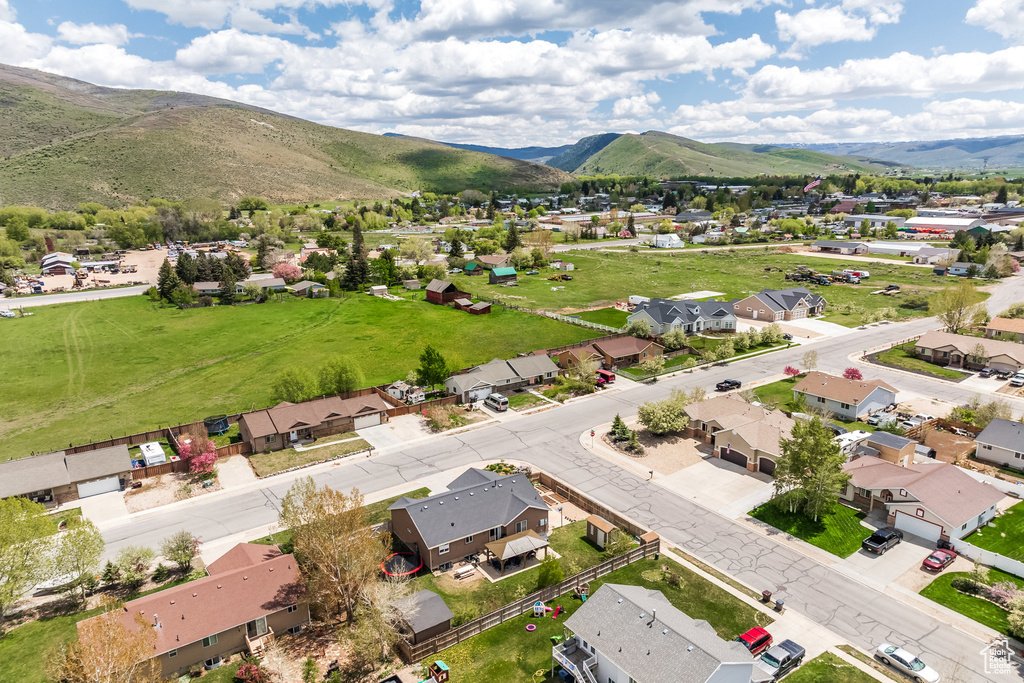 Aerial perspective of suburban area with mountains