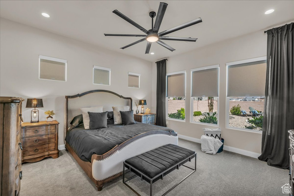 Bedroom with carpet floors, baseboards, recessed lighting, and a ceiling fan