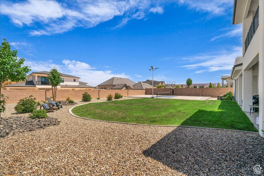 View of yard with a patio