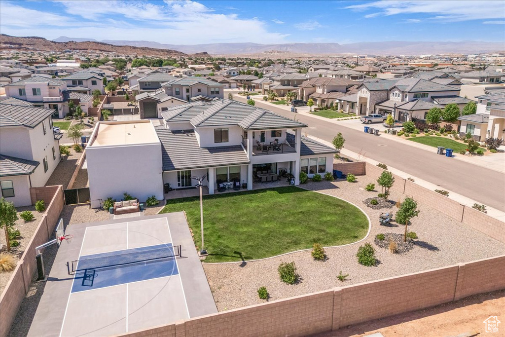 Aerial view of residential area with mountains