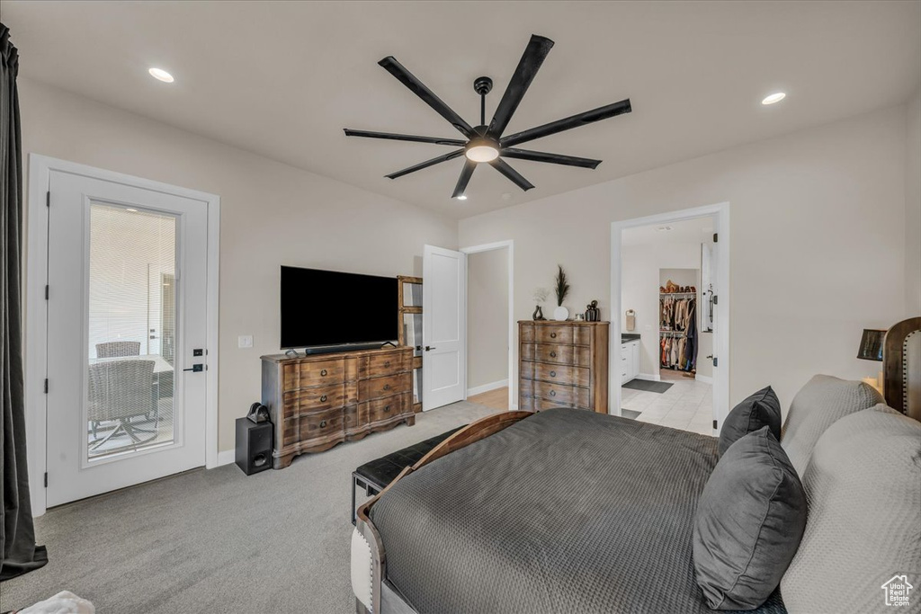 Bedroom with light carpet, ceiling fan, recessed lighting, and baseboards