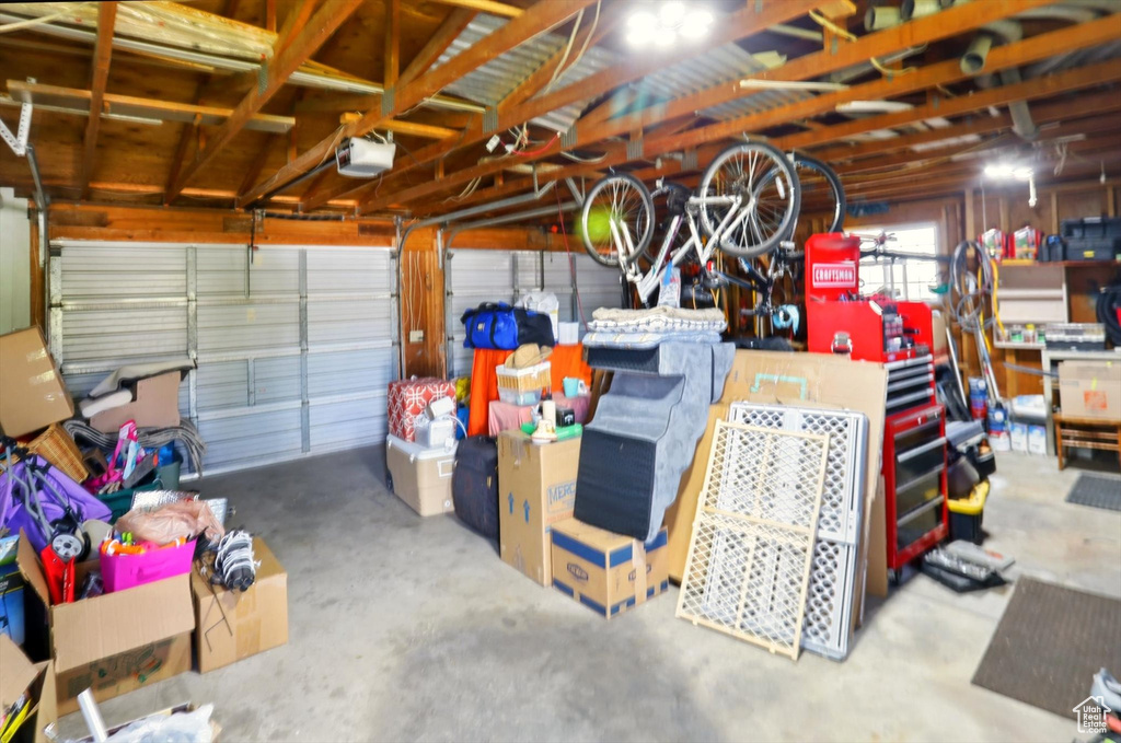 Garage featuring a garage door opener
