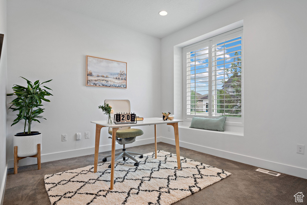 Office area featuring baseboards and recessed lighting