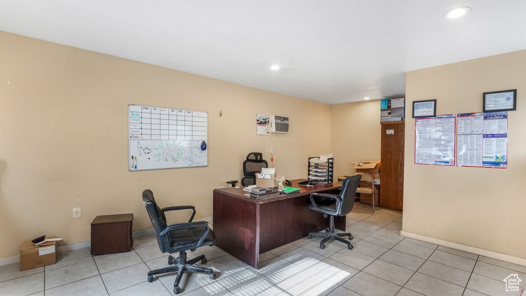 Office area with baseboards, light tile patterned floors, and recessed lighting