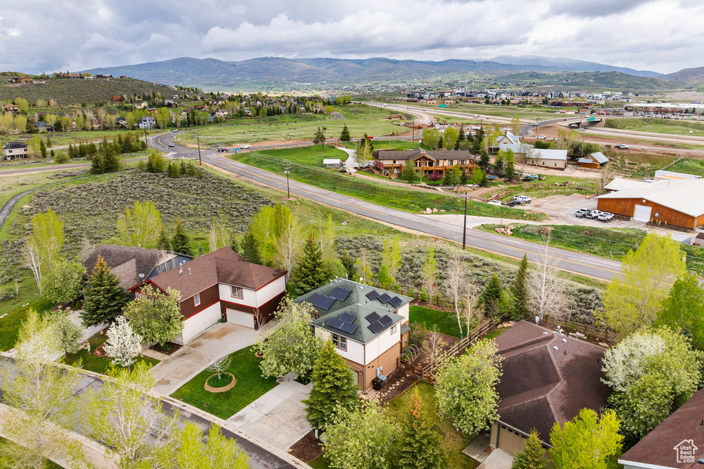 Aerial view of residential area with a mountainous background