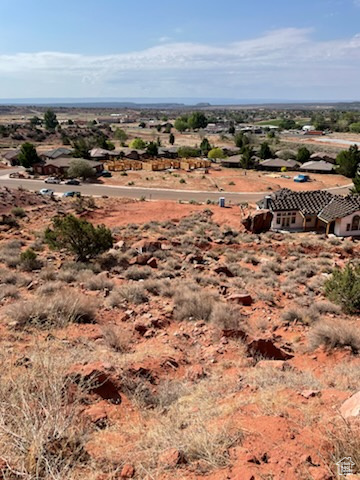Aerial view of property and surrounding area featuring rural landscape