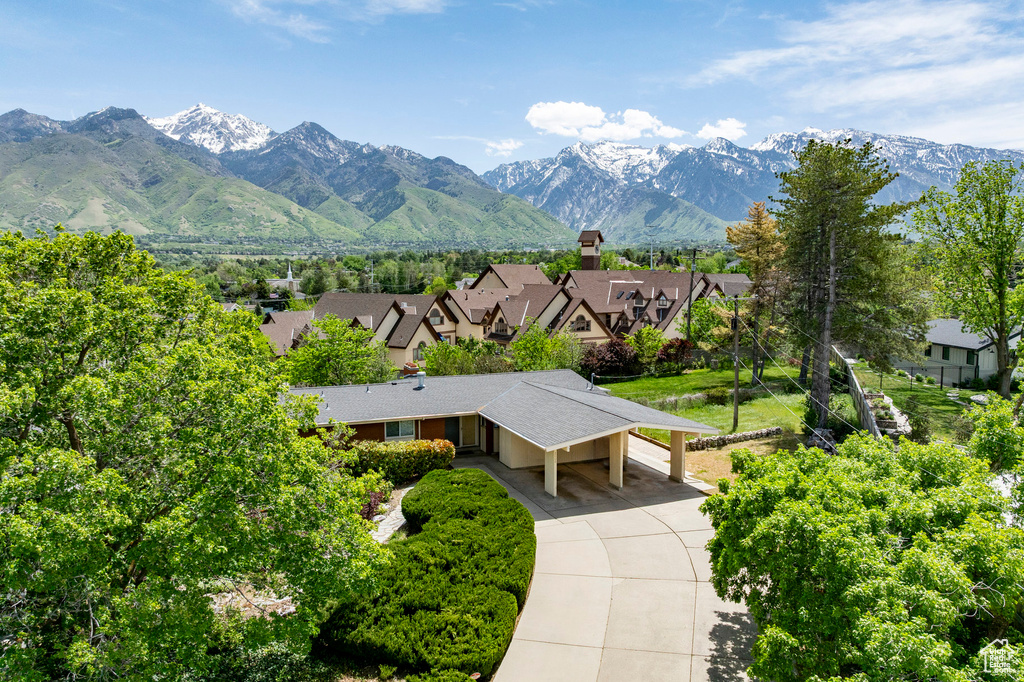 View of mountain backdrop with nearby suburban area