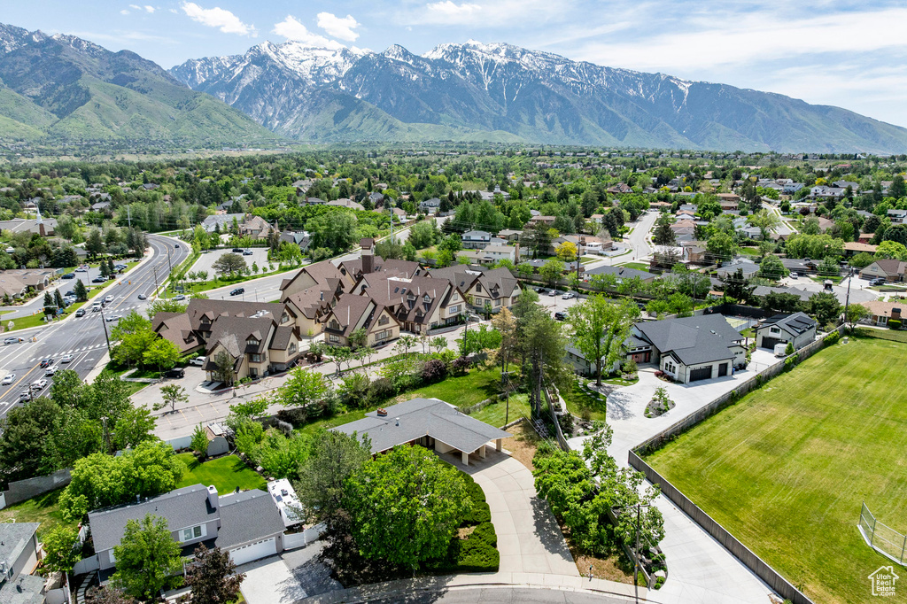 Aerial view of residential area with mountains