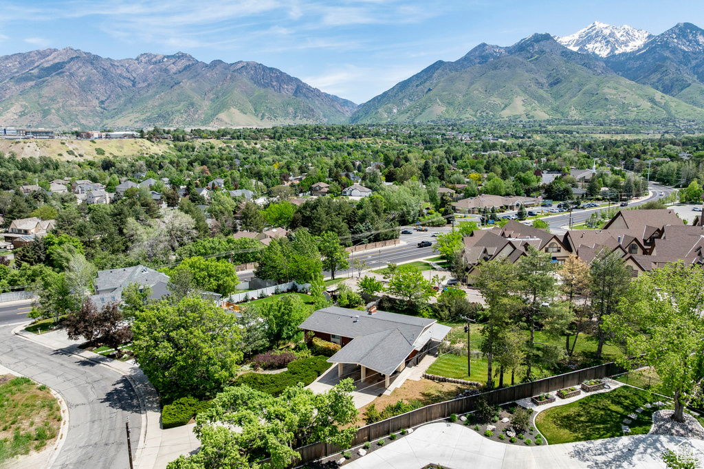 View of mountain background featuring nearby suburban area