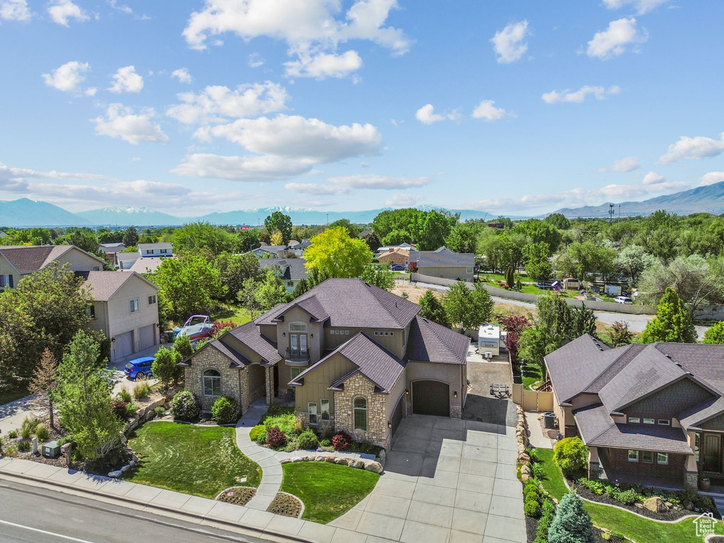 Aerial view of residential area with a mountainous background