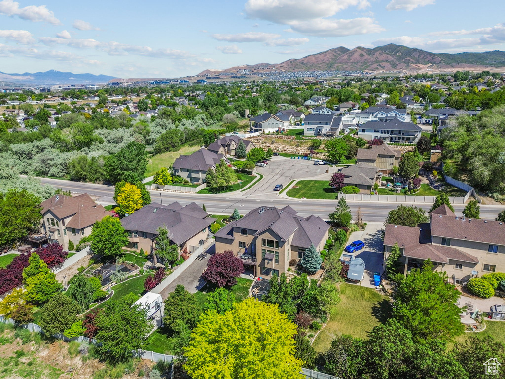 Aerial view of residential area featuring mountains