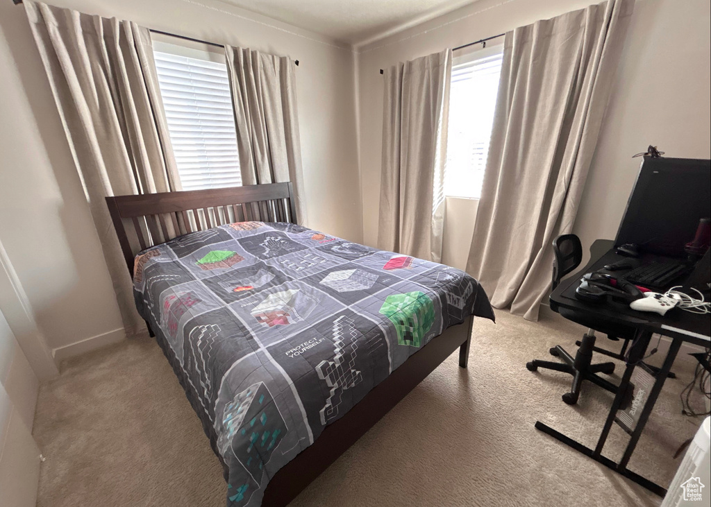 View of carpeted bedroom