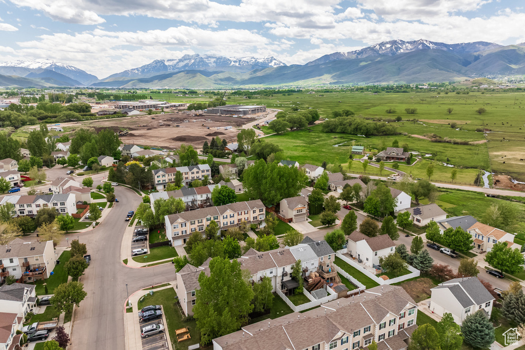 Aerial view of residential area with a mountain backdrop
