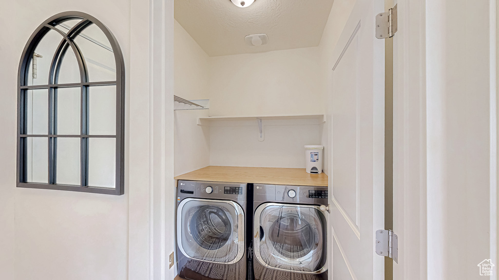 Laundry area with separate washer and dryer