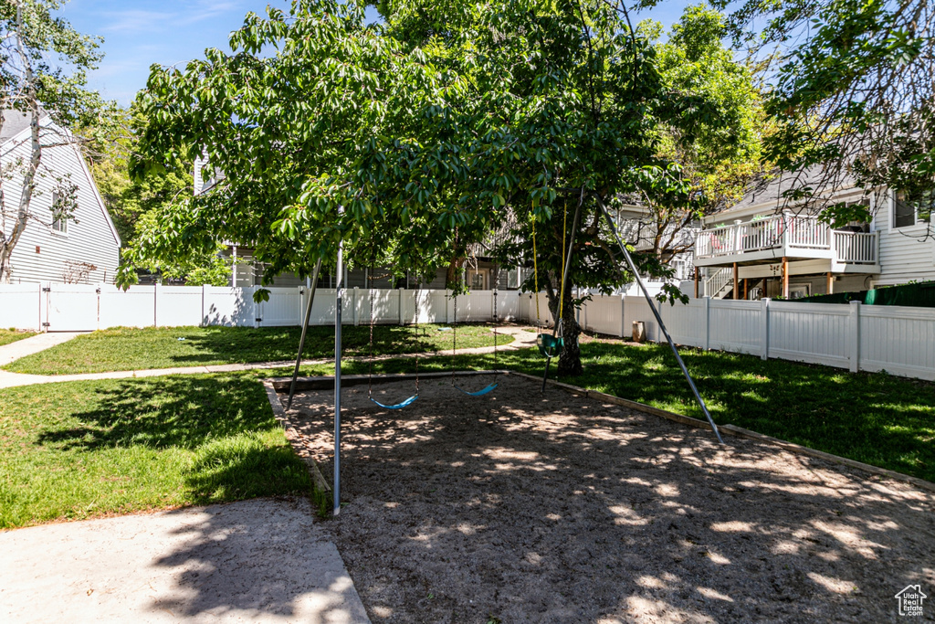 View of yard featuring a playground