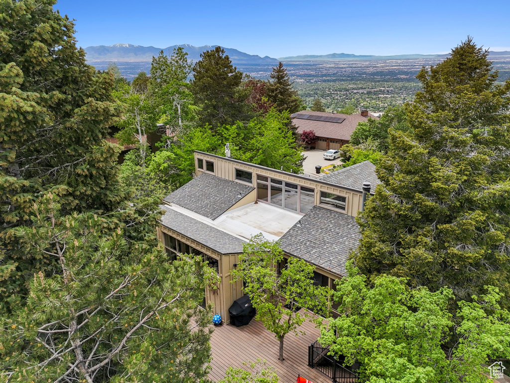 View of subject property featuring mountains
