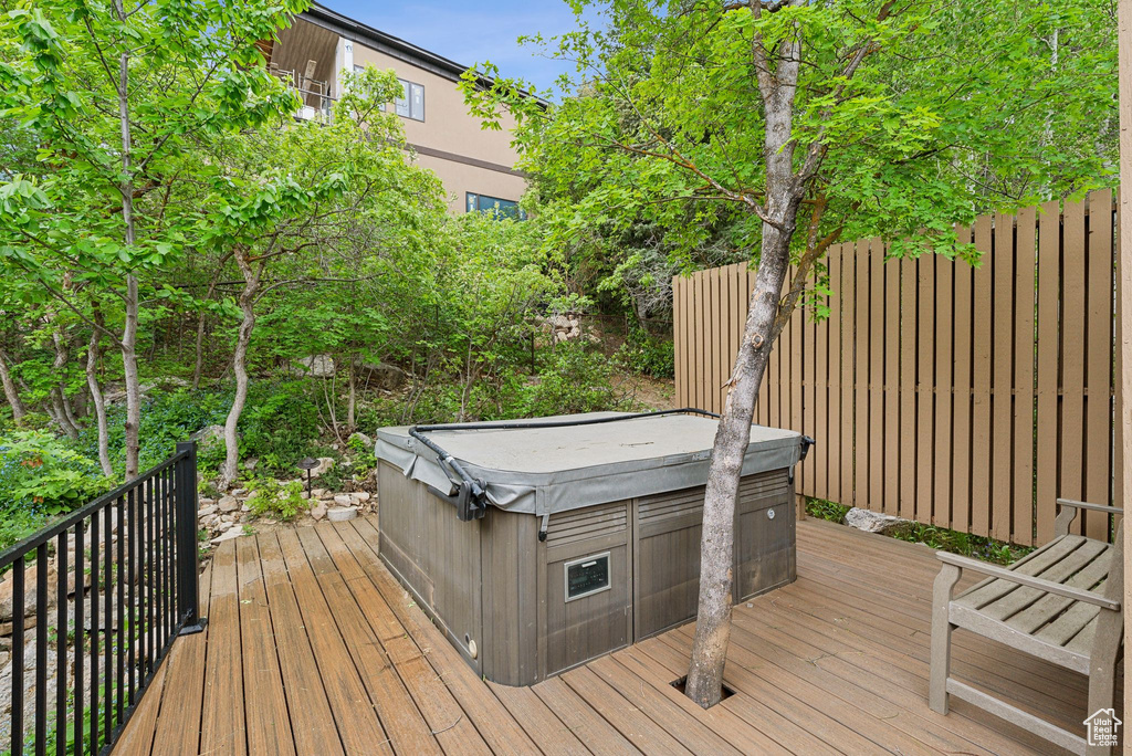 Deck featuring a hot tub