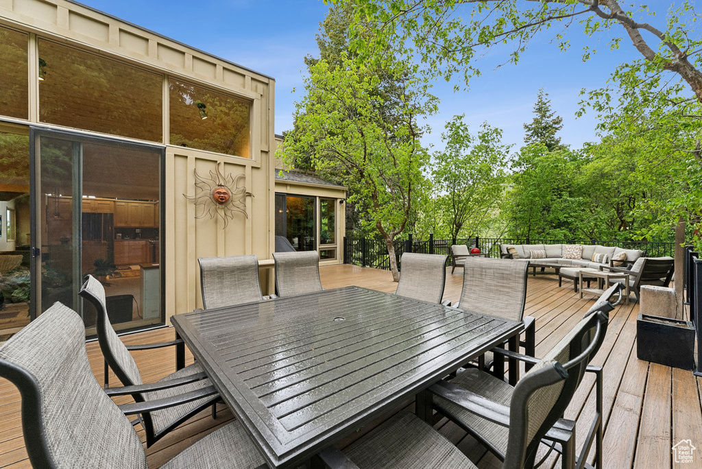 Deck featuring an outdoor hangout area and outdoor dining space