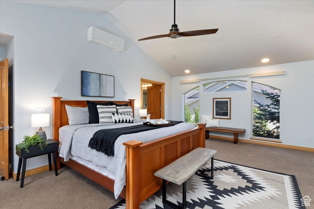 Bedroom featuring an AC wall unit, vaulted ceiling, light colored carpet, recessed lighting, and a ceiling fan