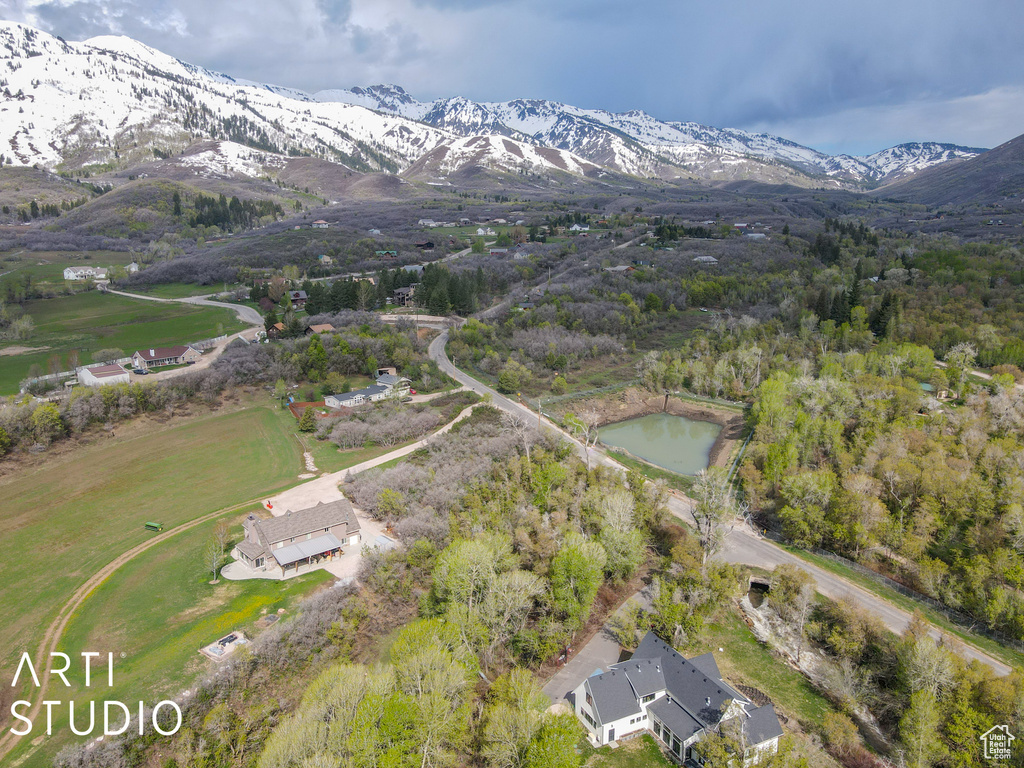 Aerial overview of property\'s location featuring mountains