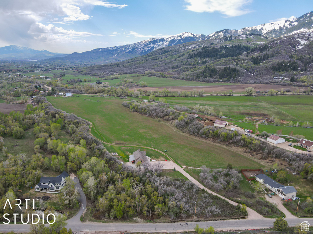 Aerial view of property\'s location featuring mountains