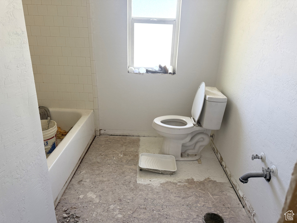 Full bathroom featuring toilet