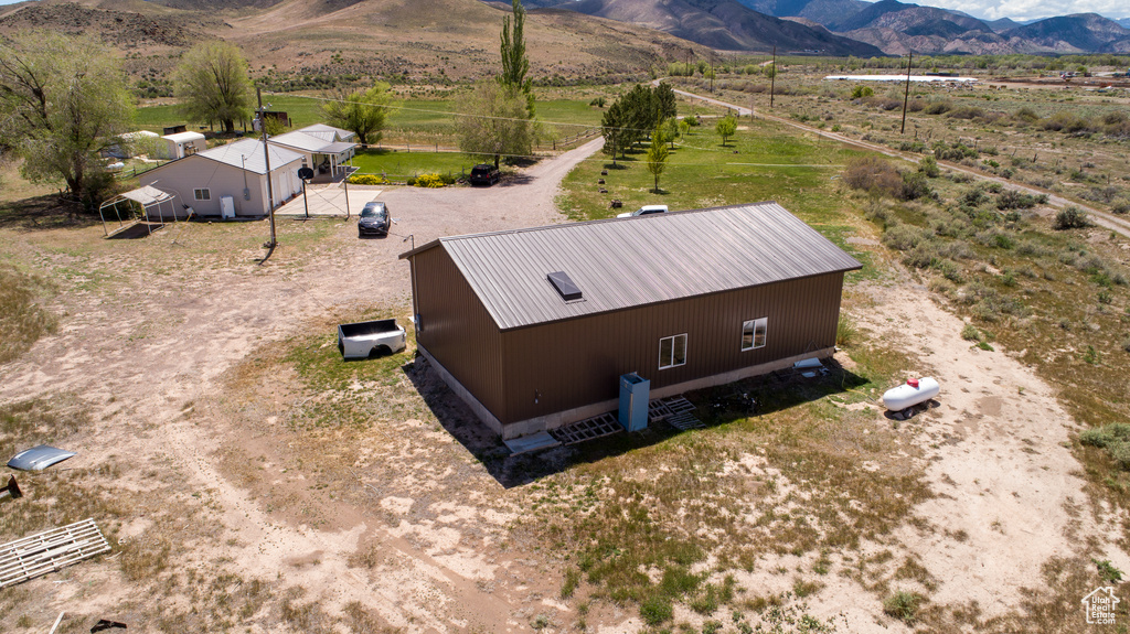 View of rural area with a mountain backdrop