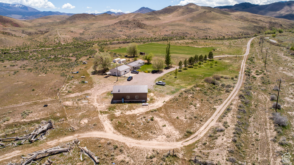 Aerial overview of property\\\\\\\\\\\\\\\'s location with rural landscape and a mountainous background
