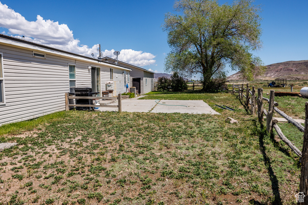 View of yard with a patio