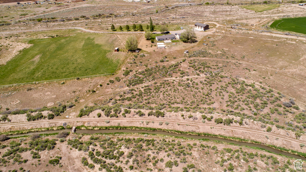 Aerial view of property and surrounding area with rural landscape