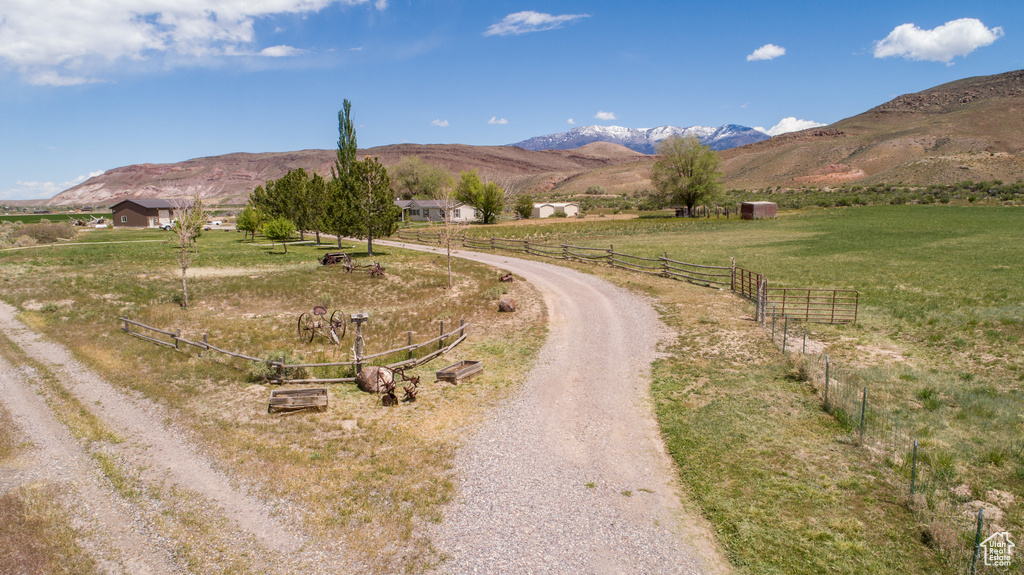 View of mountain background featuring rural landscape