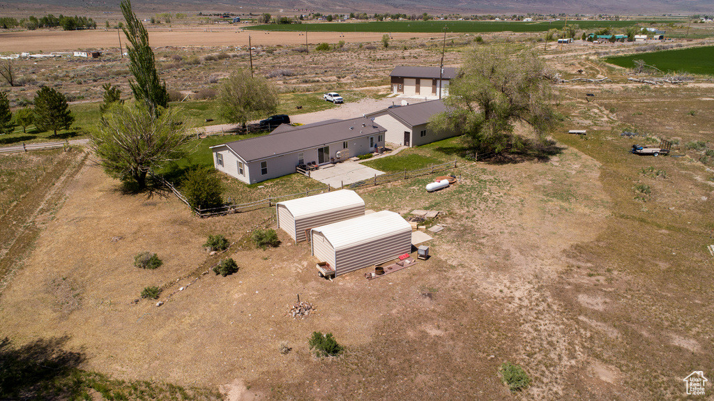 View of property location featuring a mountainous background and rural landscape