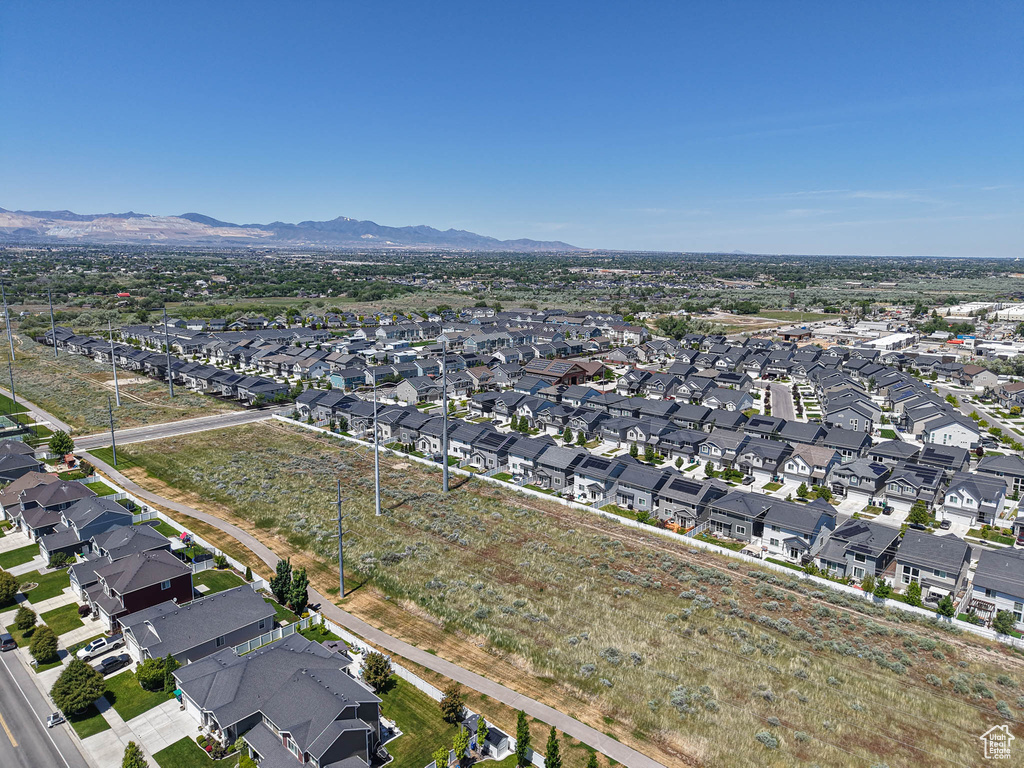 Aerial view of property\\\\\\\'s location featuring a mountain backdrop and nearby suburban area