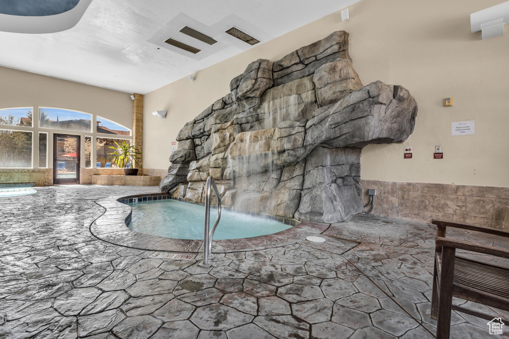 View of pool featuring a swimming pool and an in-ground hot tub