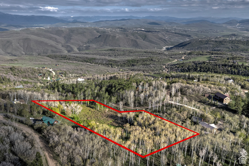 View of property location with property parcel outlined and mountains