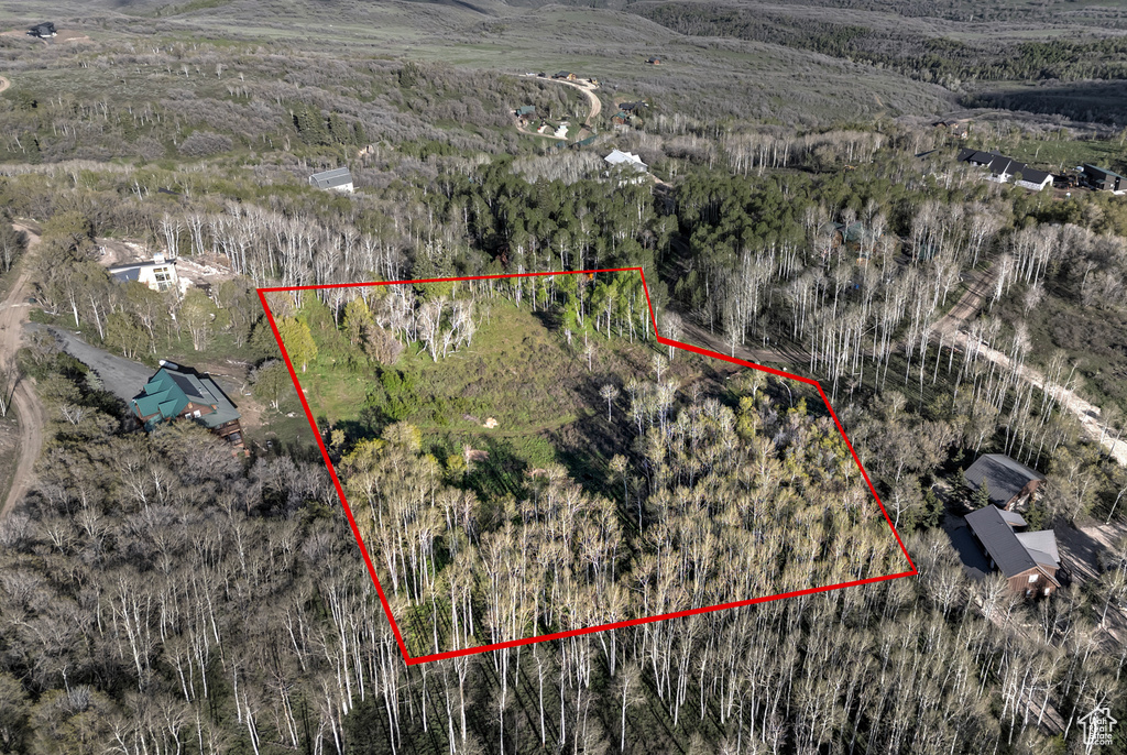 Overview of rural landscape with property parcel outlined